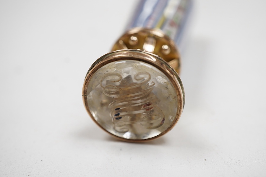 A late 19th century yellow metal and polychrome enamel desk seal, with rock crystal matrix, carved with a monogram, 69mm (small chip to the enamel), in original J.C Vickery fitted gilt tooled leather box.
